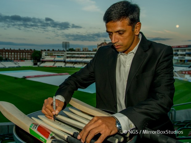 Rahul Dravid signing cricket bats during ESPNcricinfo event at OVAL